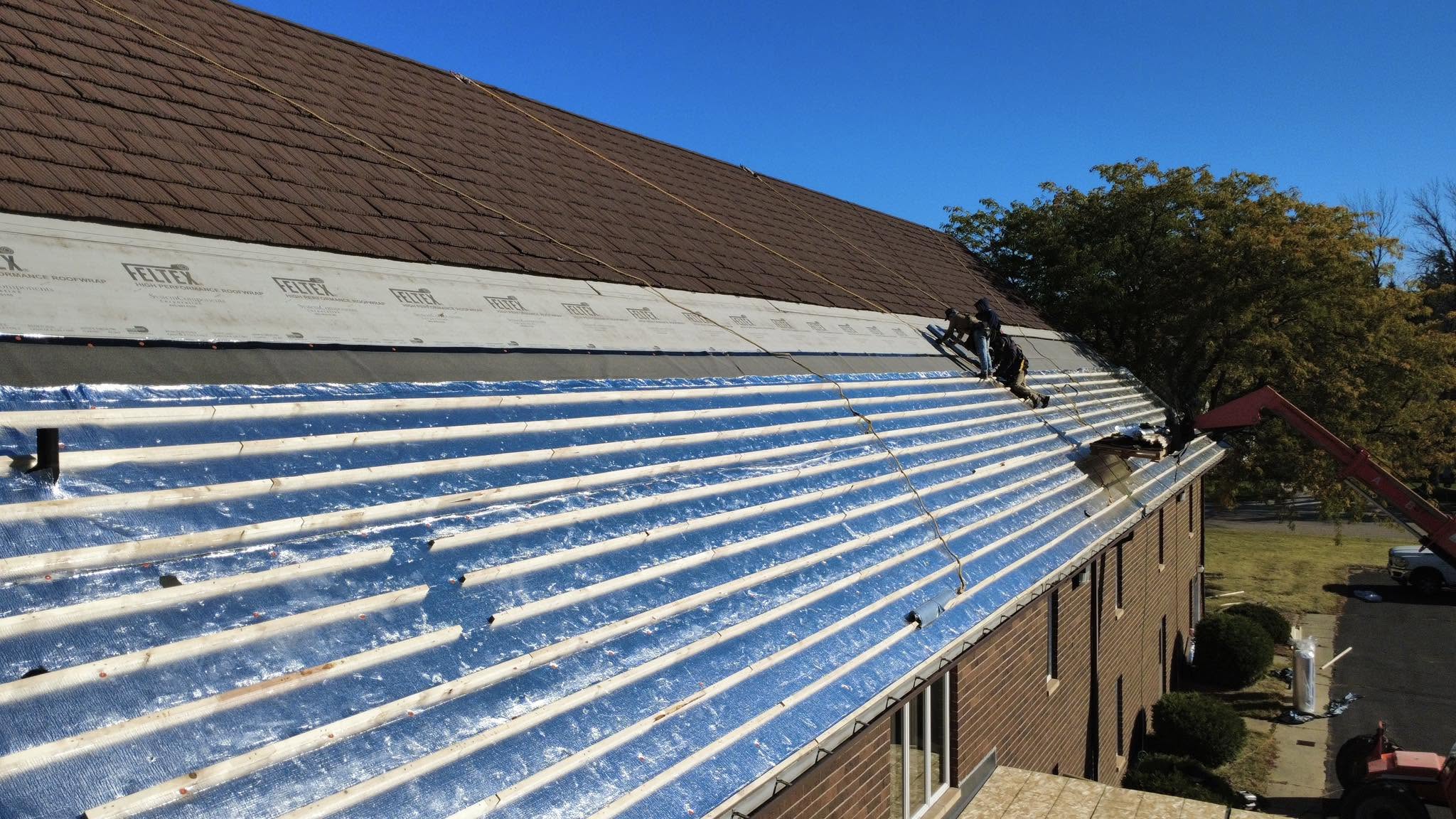 Ultima Exteriors metal roof installation in progress