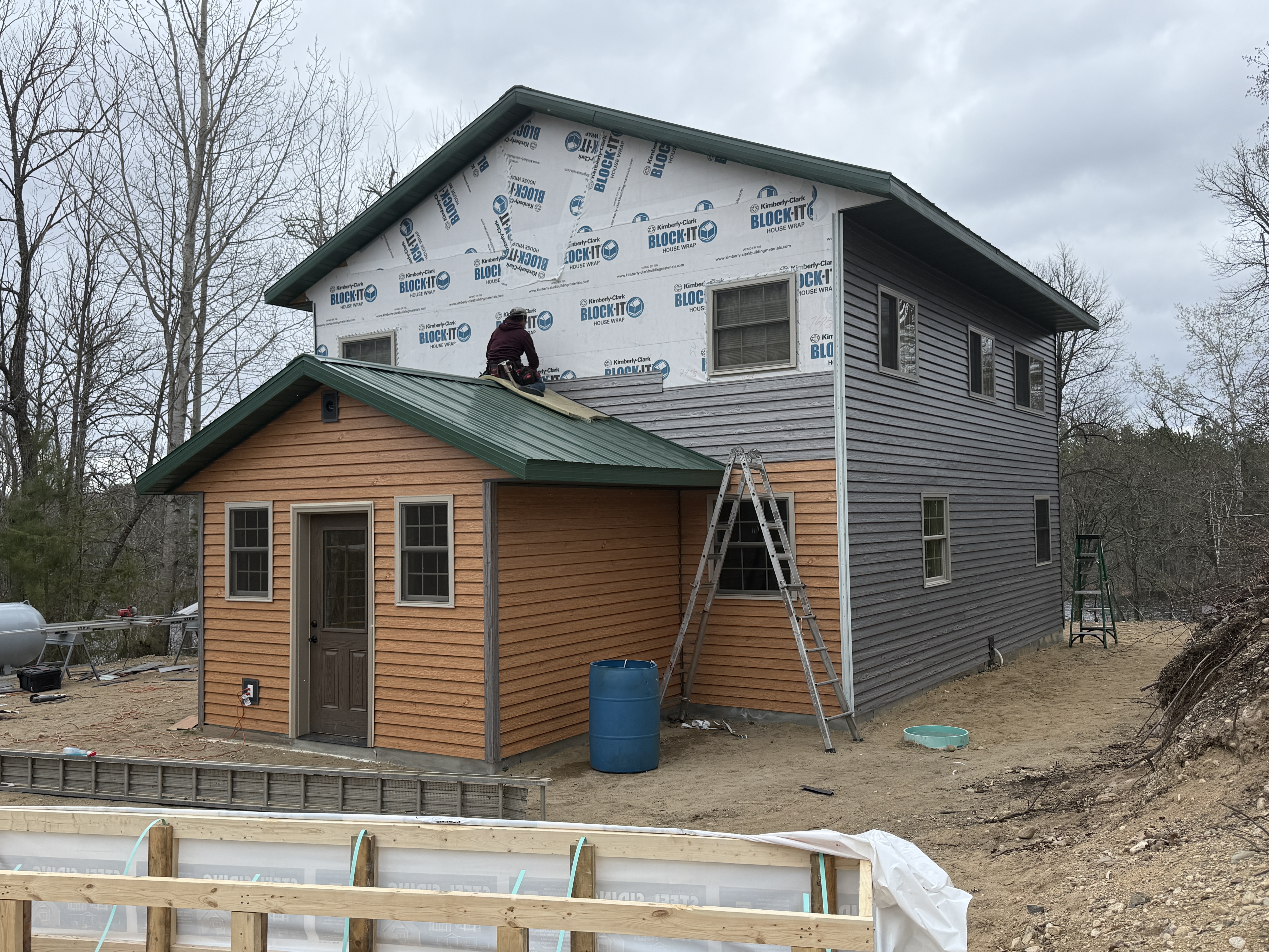 Roof replacement in progress with new decking