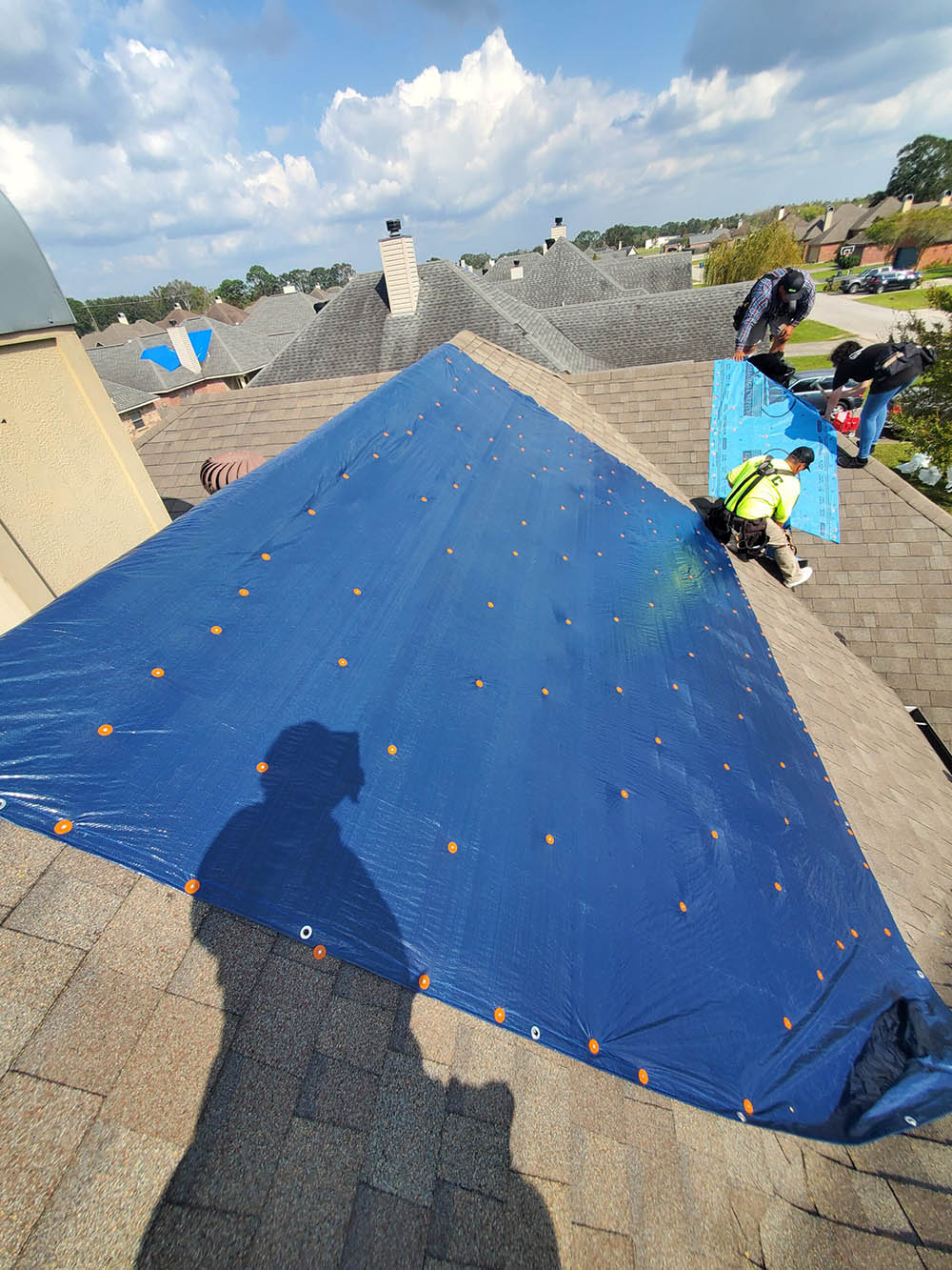 Emergency roof tarping (stock placeholder)